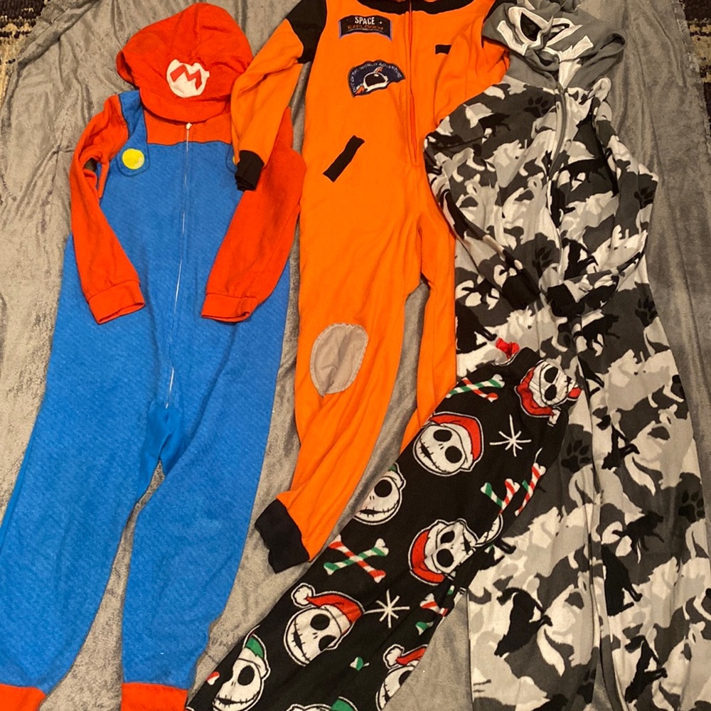 3 Union suits and one pairs of fleece pants. All size small.